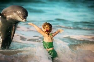 Little Girl and a Dolphin