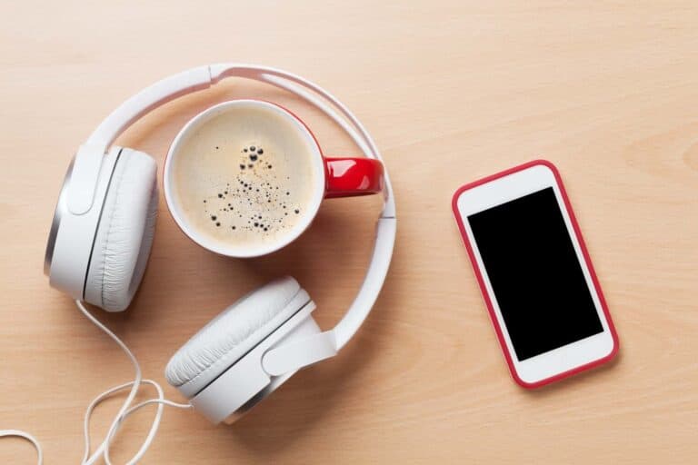 Smartphone, headphones and coffee