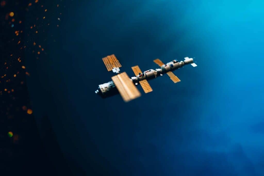 Space satellite orbiting the blue planet