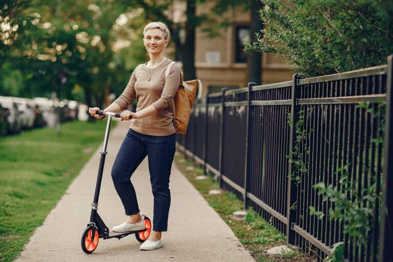 woman with kick scooter